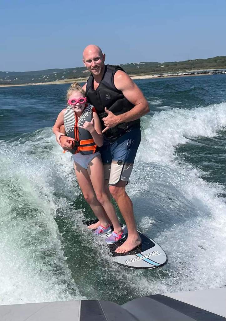 Austin Sun Boat Rentals Wake Surfing with his niece