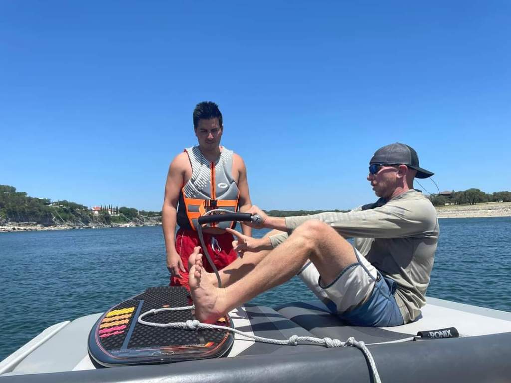 Austin Sun Boat Rentals giving tips for a first time wake surfer!