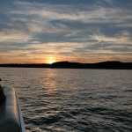 a sunset over a body of water