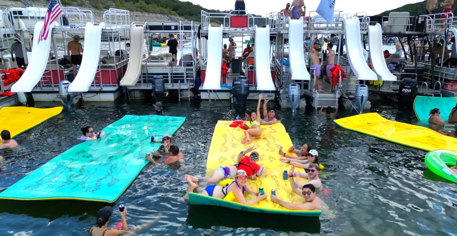 a group of people riding on the back of a boat